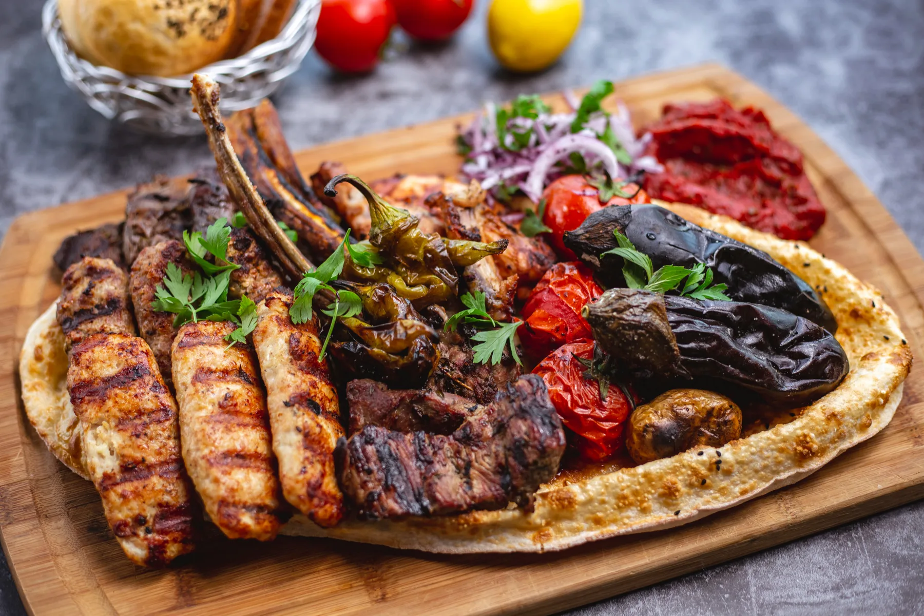 A generous Kebab 49 mixed grill with kebabs and charred vegetables
